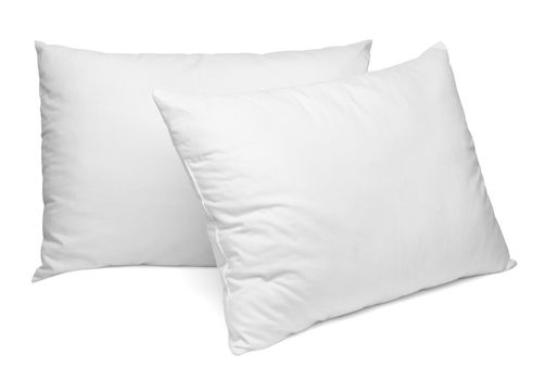 close up of a white pillow on white background