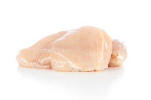 Raw chicken breast isolated on a white background with shadow