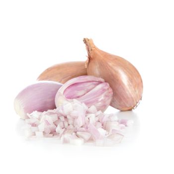 Whole and chopped shallots isolated on a white background with shadow