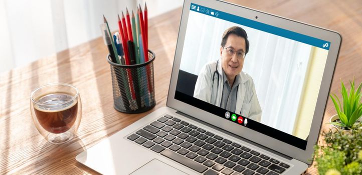 Doctor video call online by modish telemedicine software application for virtual meeting with patient