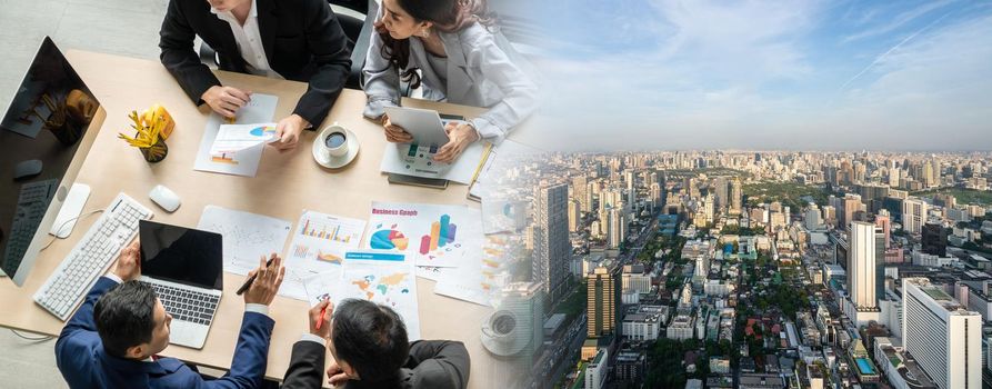 Business people group meeting shot from top widen view in office . Profession businesswomen, businessmen and office workers working in team conference with project planning document on meeting table .