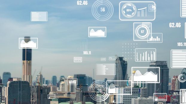 Business data analytic interface fly over smart city showing alteration future of business intelligence. Computer software and artificial intelligence are used to analyze big data for strategic plan .