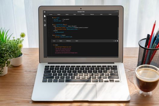 Software development programming on computer screen for modish application and program coding