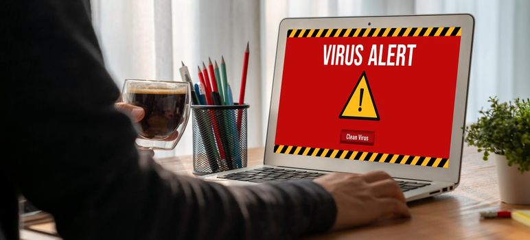 Virus warning alert on computer screen detected modish cyber threat , hacker, computer virus and malware