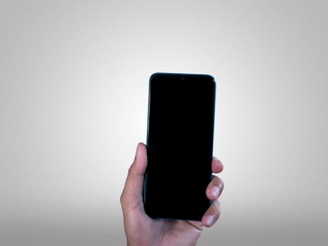 Hand businessman showing smartphone with blank screen, isolated on white background, copy space clipping path