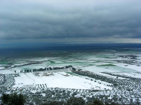 Snowy valley seen from the mountain