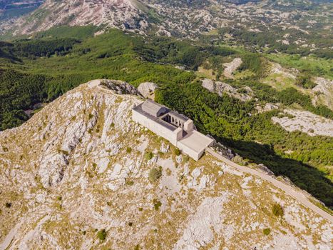 Montenegro. Lovcen National Park. Mausoleum of Negosh on Mount Lovcen. Drone. Aerial view. Viewpoint. Popular tourist attraction. Petar II Petrovic-Njegos mausoleum on the top of mount Lovchen in Montenegro. Aerial view, drone.