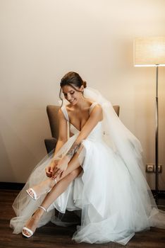 bride in a white dress at the training camp inside the hotel