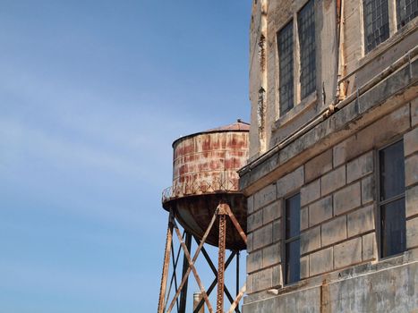 Corner of Alcatraz prison and water tower in the distance.