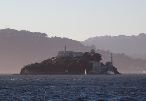 Alcatraz Island with Marin in the Background in San Francisco Bay with a lite layer of Fog