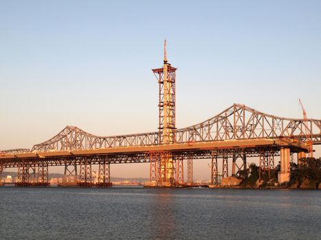 Half finished new Bay Bridge tower at dusk near San Francisco, California