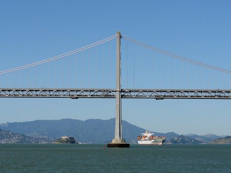 San Francisco Bay Bridge, Alcatraz, and Cargo Ship with Marin in the background on a nice day                               