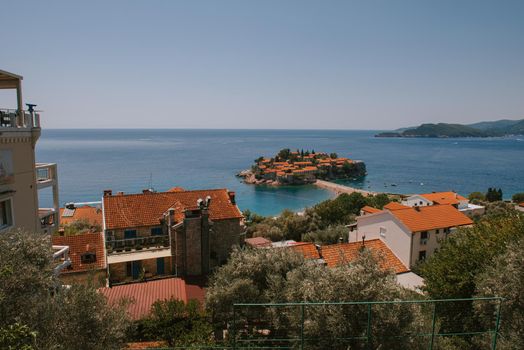 Sveti Stefan is a small isand on Adriatic coast of Montenegro near of Budva. Resort is known commercially as Aman Sveti Stefan. Sveti Stefan, Adriatic sea, Europe. Sveti Stefan peninsula on the Adriatic Sea in Budva, Montenegro