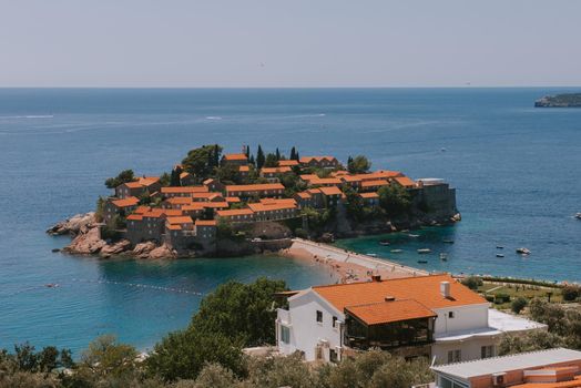 Sveti Stefan is a small isand on Adriatic coast of Montenegro near of Budva. Resort is known commercially as Aman Sveti Stefan. Sveti Stefan, Adriatic sea, Europe. Sveti Stefan peninsula on the Adriatic Sea in Budva, Montenegro