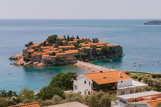 Sveti Stefan is a small isand on Adriatic coast of Montenegro near of Budva. Resort is known commercially as Aman Sveti Stefan. Sveti Stefan, Adriatic sea, Europe. Sveti Stefan peninsula on the Adriatic Sea in Budva, Montenegro