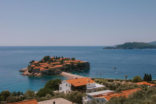 Sveti Stefan is a small isand on Adriatic coast of Montenegro near of Budva. Resort is known commercially as Aman Sveti Stefan. Sveti Stefan, Adriatic sea, Europe. Sveti Stefan peninsula on the Adriatic Sea in Budva, Montenegro