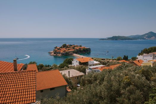 Sveti Stefan is a small isand on Adriatic coast of Montenegro near of Budva. Resort is known commercially as Aman Sveti Stefan. Sveti Stefan, Adriatic sea, Europe. Sveti Stefan peninsula on the Adriatic Sea in Budva, Montenegro