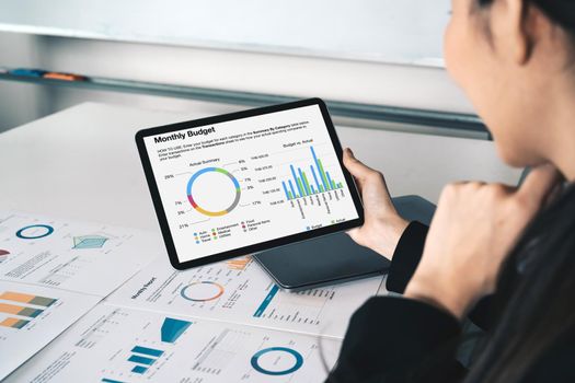 Finance manager discussing company growth project success financial statistics, professional investor working start up project for strategy plan with document, laptop and digital tablet
