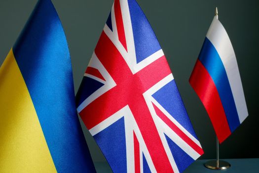 The flags of Ukraine and Great Britain are far from flag of Russia.