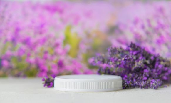 White lavender podium for place cosmetics. Selective focus. Nature.
