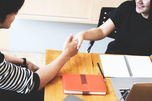 Young businessmen collaborate with partners to increase their business investment network for Plans to improve quality next month in their office.