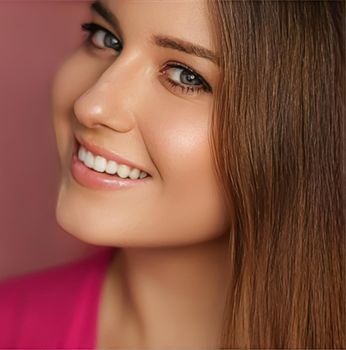 Beauty, makeup and skincare cosmetics model face portrait on pink background, smiling woman with natural makeup, perfect healthy teeth, dental care closeup