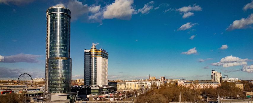 Panorama of the city with two high-rise buildings