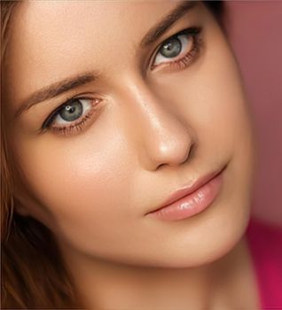Beauty, makeup and skincare cosmetics model face portrait on pink background, beautiful woman with natural make-up, perfect healthy skin glow, facial care closeup