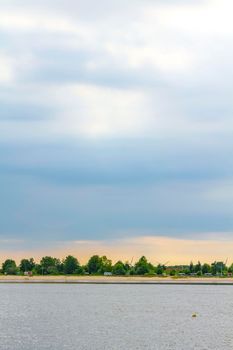 Beautiful wadden sea tidelands coast beach water and dike landscape panorama of the Harrier Sand island in Schwanewede Osterholz Lower Saxony Germany.