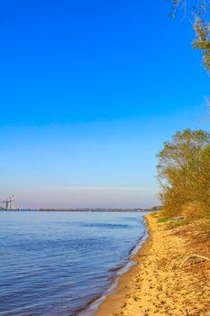 Beautiful wadden sea tidelands coast beach water and dike landscape panorama of the Harrier Sand island in Schwanewede Osterholz Lower Saxony Germany.