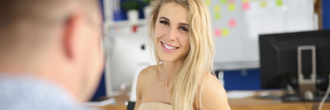 Portrait of beautiful young woman distract office worker from work. Man work on laptop, open website. Business, break from work, not productive concept