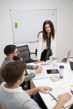 Corporate business team and manager in a meeting at IT company office