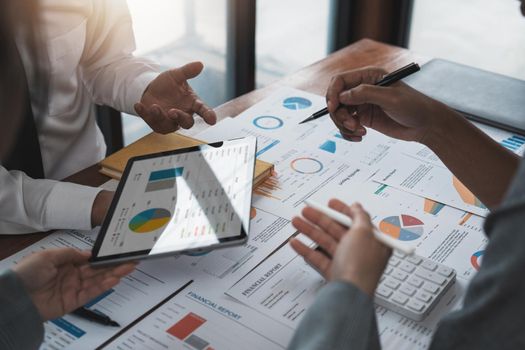 Business team colleagues meeting to conference professional investor working a new marketing business strategy project discussion and analysis data chart and graph, finance and accounting concept
