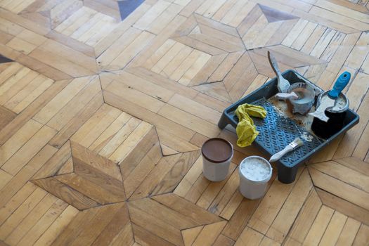 Renovated brown oak parquet, Reconstruction old house symbol, Wooden oak parquet floor background
