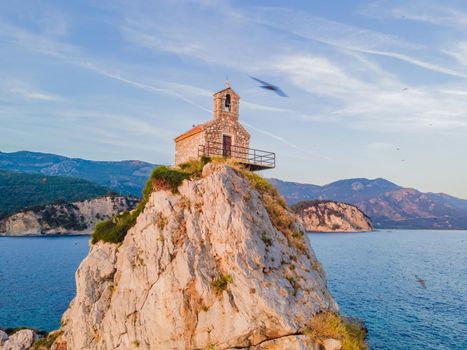 Sveta Nedelja is an islet on the Adriatic Sea, in Montenegrin municipality of Budva. It is located opposite the town of Petrovac na Moru in Montenegro. It has a small church on it.