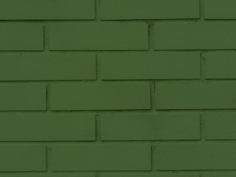 Old Green Brick Building Surface. Patinated and textured brick wall