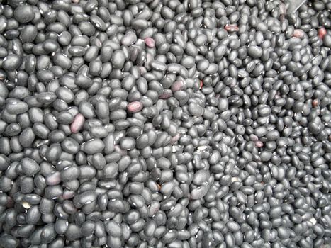 Pile of black beans for background texture.