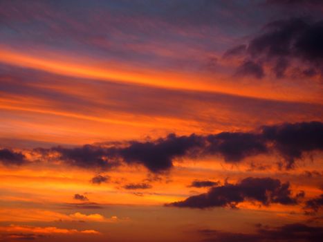 Red Orange Cloudy Sky at Dusk on Oahu, Hawaii.