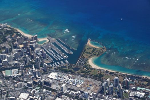 Waikiki, Ala Wai Canal, Ala Moana Mall, Park, Convention Center, Condos, Hotels of Honolulu and Ocean Aerial view during the day.  Oahu, Hawaii