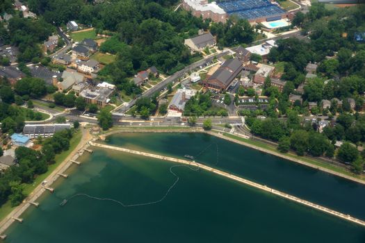 Aerial of Georgetown Reservoir, roads, and surrounding buildings outside of Washington DC.