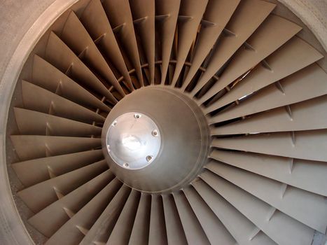 The turbine and blades of a jet engine.