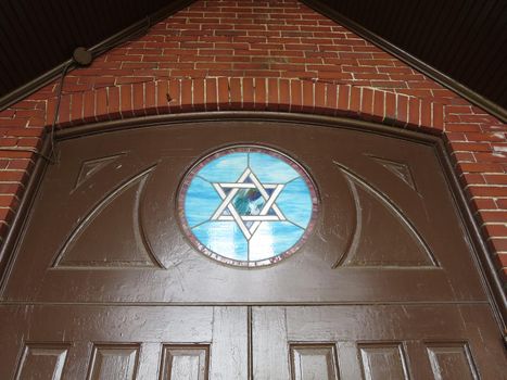 Doorway with stain glass Jewish Star at the Maine Jewish Museum - Historic Etz Chaim Synagogue built in the 1920's.  Portland, Maine.