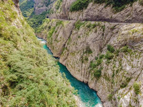 The purest waters of the turquoise color of the river Moraca flowing among the canyons. Travel around Montenegro concept.