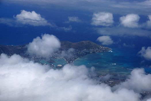 Aerial view of Kuapa Pond, Hawaii Kai Town, Portlock, clouds and Pacific Ocean on Oahu, Hawaii.