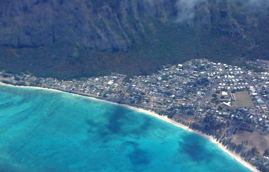 Aerial view of Waimanalo Beach, Homes, bay. Highway, Park, farms, koolau mountains, and  Pacific Ocean on Oahu, Hawaii.