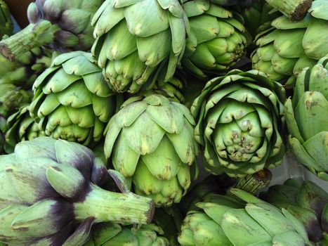 Close-up of Pile of Artichoke on display at a farmers market in San Francisco, CA 