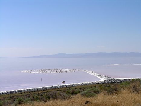 SALT LAKE, UTAH - AUGUST 25: view of Spiral Jetty swirls in the water, Robert Smithson's masterpiece earthwork, on the north side of the Great Salt Lake, about two-and-a-half hours from Salt Lake City. AUGUST 25, 2005