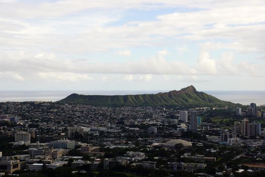 Aerial view of Diamondhead, Kapiolani Park, Waikiki, Ala Wai Canal, Kapahulu town, Pacific ocean, clouds, and Golf Course on Oahu, Hawaii.  October 2014.