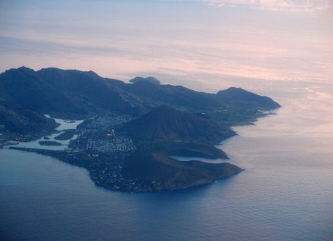 Aerial of Southeast corner of Oahu in early morning including Hawaii Kai, Koko Head Crater, Hanauma Bay, Portlock, and Sandy Beach.