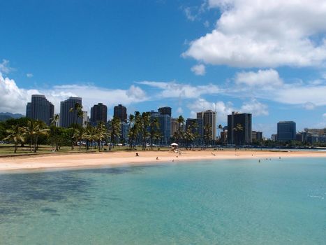 Beach on Magic Island in Ala Moana Beach Park on the island of Oahu, Hawaii.  On a beautiful day.